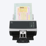 Ricoh fi-8150 scanner loaded with a mixed batch of documents